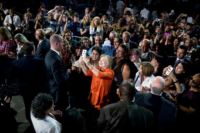 Seddique Mateen was spotted behind Clinton as she spoke during a campaign rally Monday in Florida. (AP Photo/Andrew Harnik)