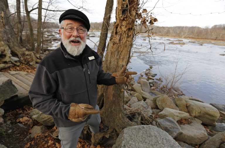   In this Tuesday, Dec. 11, 2012, photo, James River Park manager, Ralph White, looks over the James River at the Pony Pasture park, in Richmond, VA. White, who is retiring this month, has received a steady stream of testimonials for the 32 years he devoted to the James River Park System, the 550-plus-acre green oasis he has managed with prickly enthusiasm. (AP Photo/Steve Helber)  