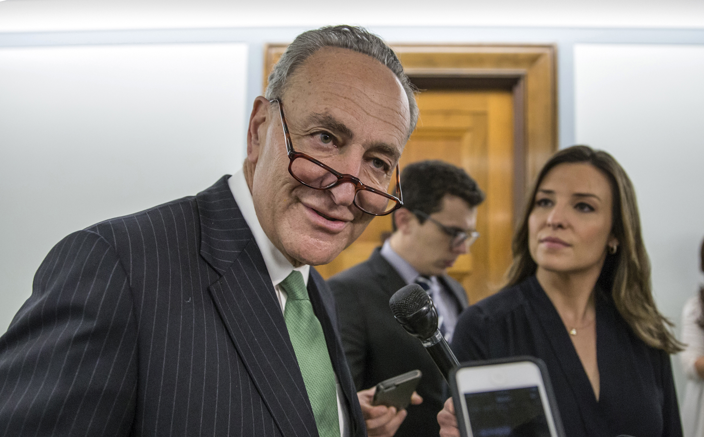 New leader Schumer adapts as Democrats move leftward
