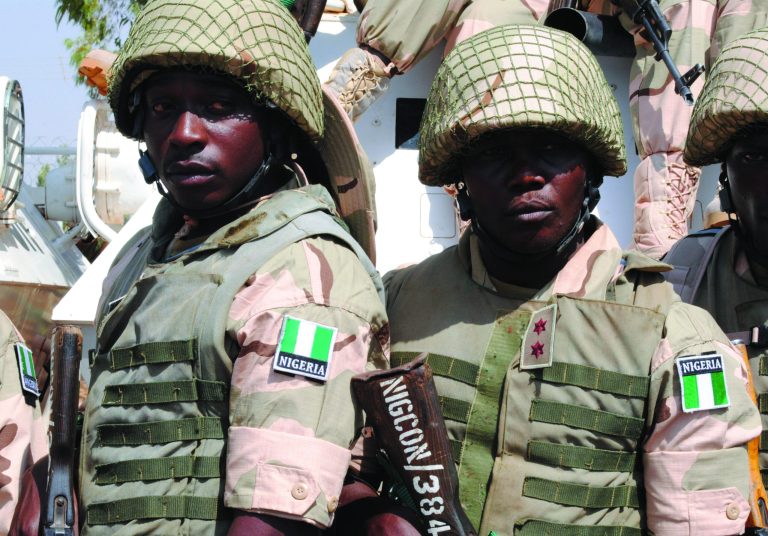 Nigeria battalion 1 troops, part of the African led international support mission to Mali are seen before their departure, at the peace keeping centre in Jaji, Kaduna, Nigeria, Thursday, Jan. 17, 2013. The Federal Government has approved the immediate deployment of 900 troops as part of the ECOWAS (Economic Community of West African States ) force to push for the emancipation of Northern Mali from the grip of Islamists. (AP Photo)