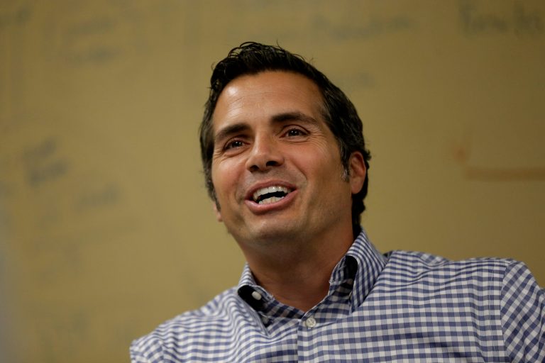 Greg Orman is taking heat for avoiding questions on politically charged issues and being cagey about which party he would caucus with if he's elected to the Senate. (AP Photo)