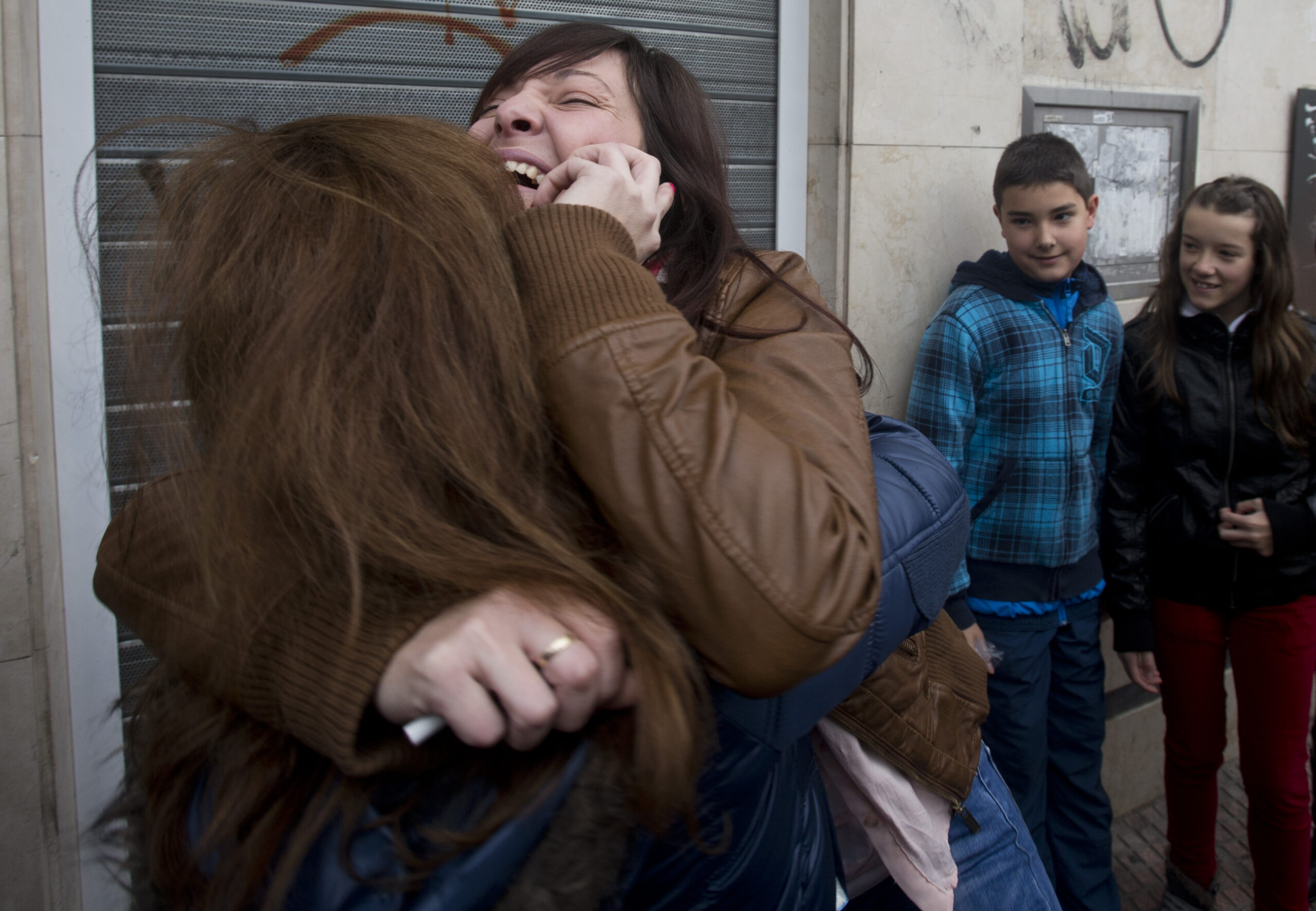 Hurting Spaniards celebrate Christmas lottery wins