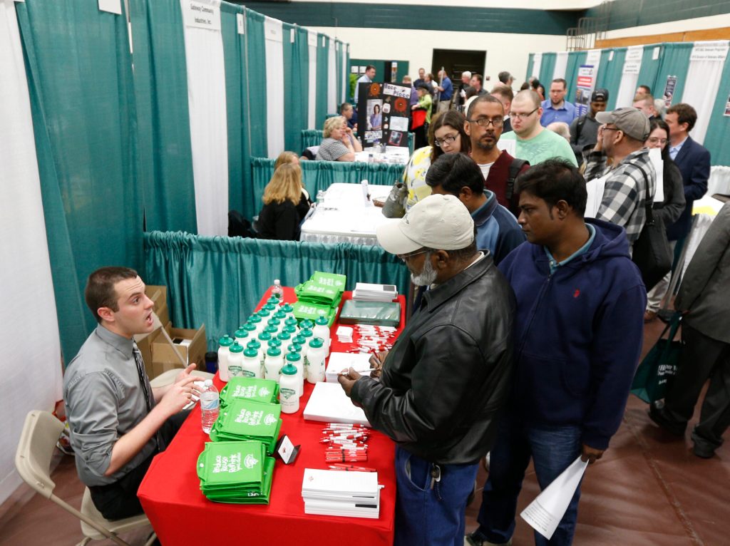 Applications for US unemployment aid fall to 319k