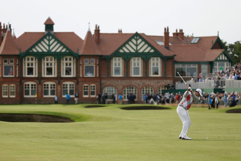 Adam Scott of Australia plays a shot onto the 18th green at Royal Lytham & St Annes golf club during the third round of the British Open Golf Championship, Lytham St Annes, England, Saturday, July 21, 2012. (AP Photo/Peter Morrison)