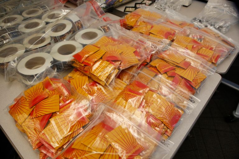 Confiscated synthetic drugs are on display at a news conference at the DEA offices in Centennial, Colo., on Wednesday, May 7, 2014, where it was announced that a federal grand jury in Denver has returned indictments charging nine individuals from across the country with conspiracy and drug distribution charges related to 