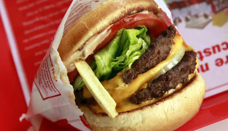 A burger is displayed at the opening of the In-N-Out in Allen, Texas, on May 11, 2011.