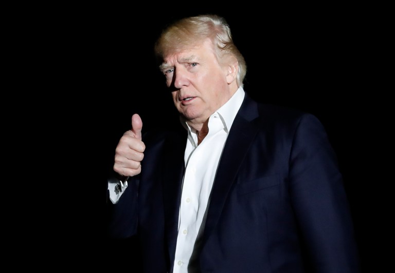 President Donald Trump give the thumbs-up as he walks from Marine One across the South Lawn to the White House in Washington, Sunday, May 7, 2017, as he returns from Trump National Golf Club in Bedminster, N.J. (AP Photo/Carolyn Kaster)