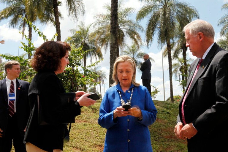 A State official warned a handful of Hillary Clinton's top aides that emails on the official, State-issued Blackberry 
