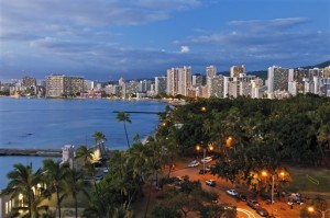  A high angle twilight view of Kapiolani Beach Park and the high-rise hotels along the shoreline of Waikiki, Honolulu. (AP Photo)