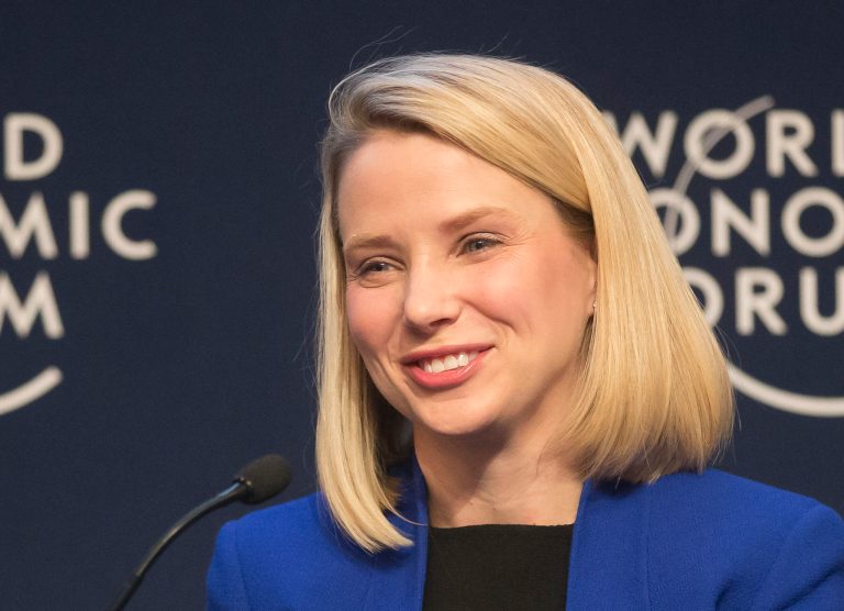 FILE - In this Wednesday, Jan. 22, 2014, file photo, Yahoo CEO Marissa Mayer smiles during a session at the World Economic Forum in Davos, Switzerland. Yahoo reports quarterly earnings on Tuesday, Jan. 28, 2014.  (AP Photo/Michel Euler, File)