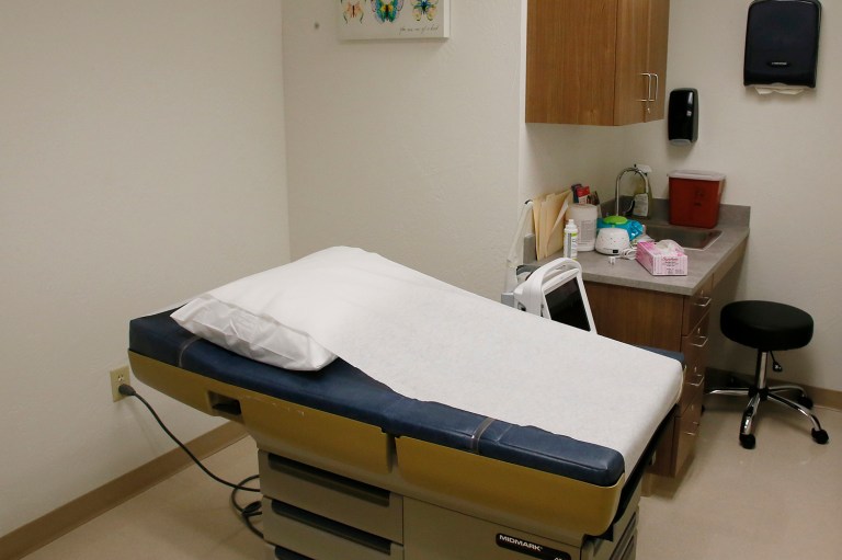 Oklahoma's state Supreme Court unanimously struck down a law requiring abortion providers to have hospital admitting privileges. (AP Photo/Sue Ogrocki)