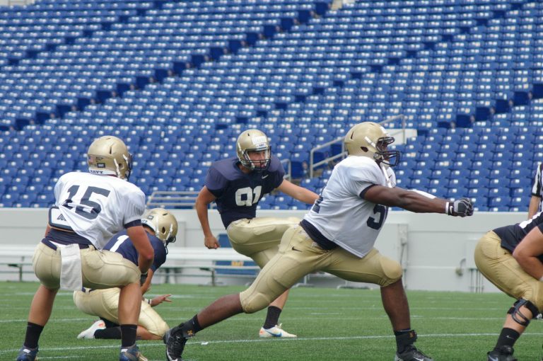  North Stafford graduate Austin Grebe, shown in an earlier scrimmage this preseason, made all five of his kicks on Friday. He and fellow freshman Nick Sloan have emerged as the top candidates for placement duty. / Photo by Kevin Dunleavy.    