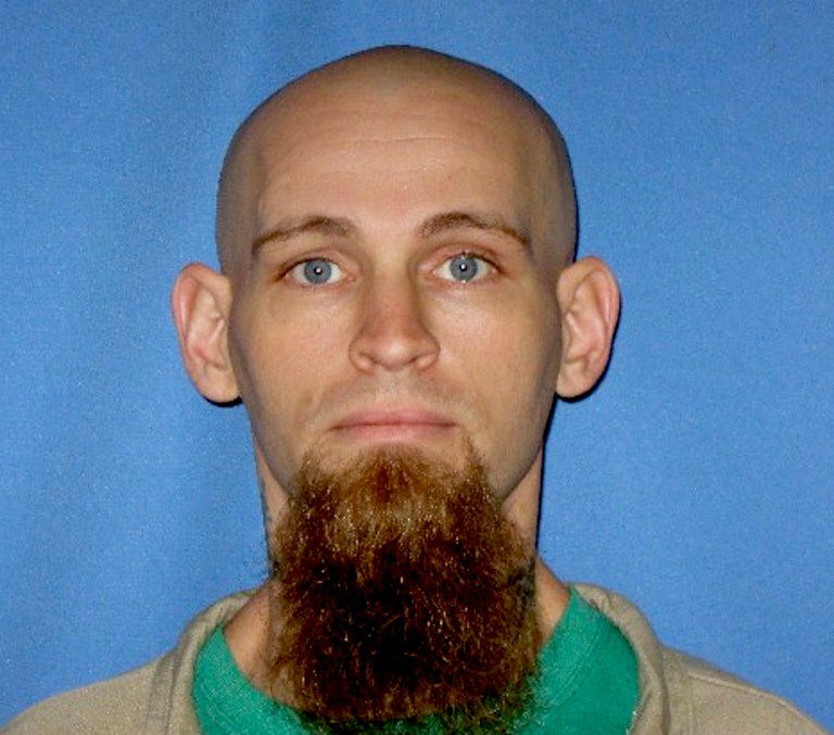 This undated photo provided by the Illinois Department of Corrections shows Jared Carter. An Associated Press analysis shows nearly two dozen Illinois inmates are escaped from prison _ with some gone for 40 years. The Illinois Department of Corrections says it never stops looking for them or closes a case. The review was spurred by the escape last summer of Carter from a prison work crew. He was found four days later and was sentenced in March to 11 more years behind bars. (AP Photo/Illinois Department of Corrections)