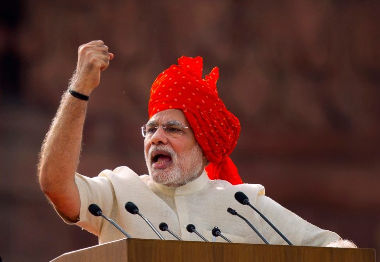FILE- In this Aug. 15, 2014 file photo, Indian Prime Minister Narendra Modi  addresses the nation on the country's Independence Day in New Delhi, India. When Prime Minister Narendra Modi swept to power in India's most resounding election victory in decades, he promised to revive the sluggish economy, rein in rising food prices, tackle corruption and overhaul his predecessor's lackluster foreign policy.  (AP Photo/Saurabh Das, File)