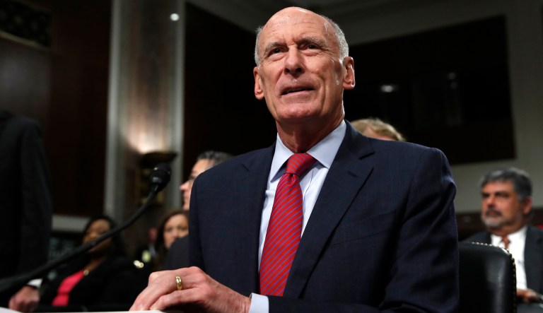 Director of National Intelligence Dan Coats prepares to testify before the Senate Armed Services Committee hearing on worldwide threats. (AP Photo/Jacquelyn Martin)