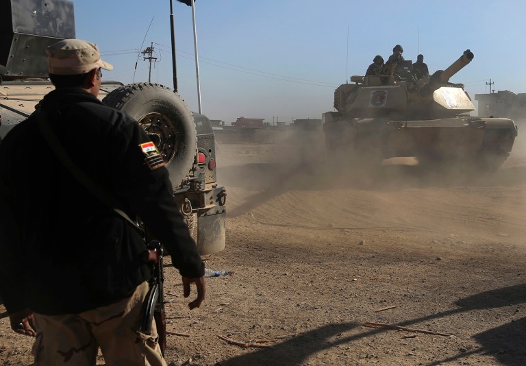 Reports said the Islamic State took credit for blowing up a gasoline tanker that was parked near a gas station. (AP Photo/Hussein Malla)