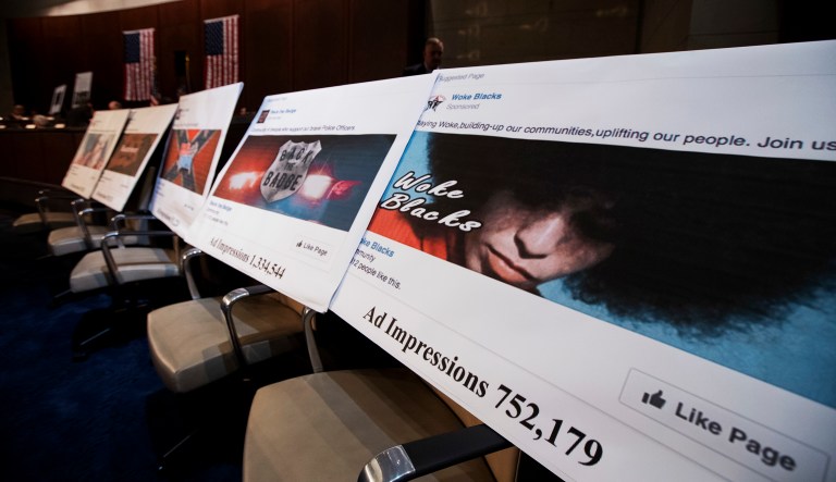Facebook ads linked to a Russian effort to disrupt the American political process were displayed as Google's senior vice president and general counsel, Facebook's general counsel, and Twitter's acting general counsel testified during House Intelligence Committee hearings on Capitol Hill this week. (AP Photo/Manuel Balce Ceneta)