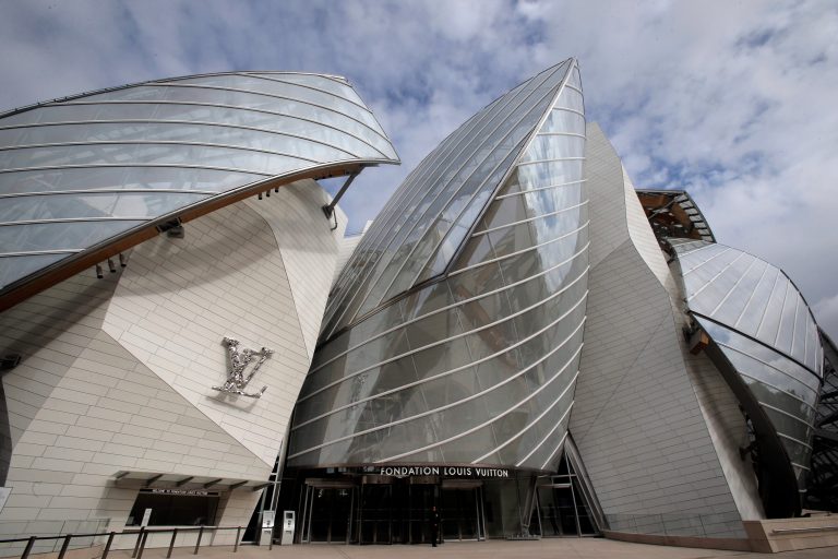 The Louis Vuitton Foundation art museum and cultural center, created by American architect Frank Gehry, is photographed during the press day, in Paris, Friday, Oct. 17, 2014. The 100-million-euro building, with billowing glass casing and 11 gallery spaces, has been compared to an iceberg or giant sailboat and took over a decade to make. (AP Photo/Christophe Ena)