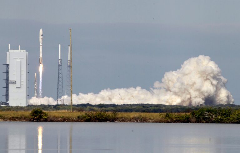   A United Launch Alliance Atlas V rocket, carrying an X-37B experimental robotic space plane, lifts off from launch complex 41 at the Cape Canaveral Air Force Station, Tuesday, Dec. 11, 2012, in Cape Canaveral, Fla. Air Force officials said the unmanned space plane, which resembles a miniature space shuttle, provides a way to test technologies in space.(AP Photo/John Raoux)  