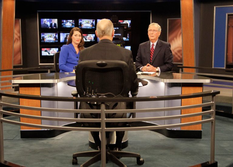 Senate Minority Leader Mitch McConnell and his Democratic opponent, Kentucky Secretary of State Alison Lundergan Grimes, speak with host Bill Goodman before their appearance on 