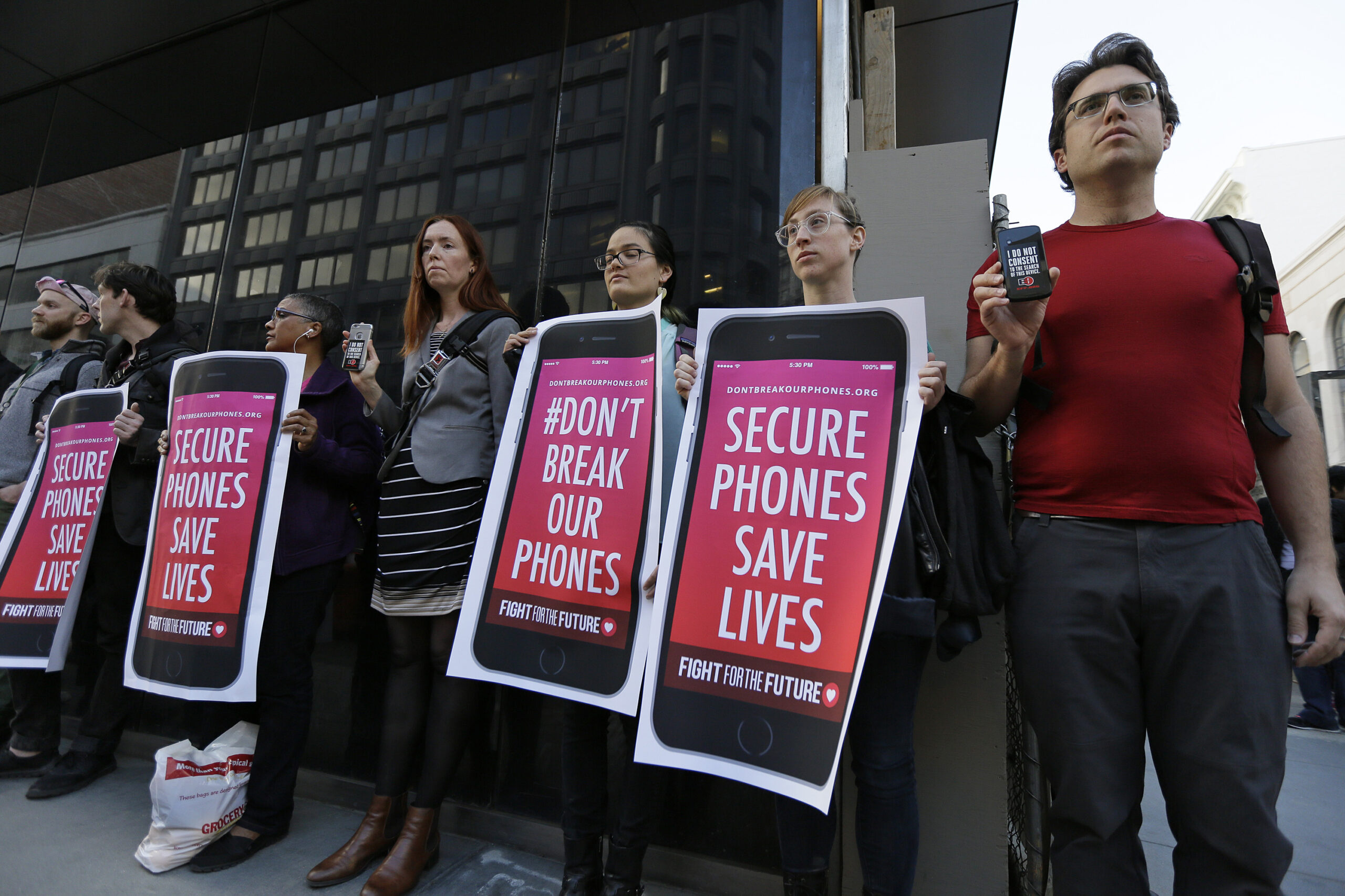 Justice demands Apple help access nine more iPhones