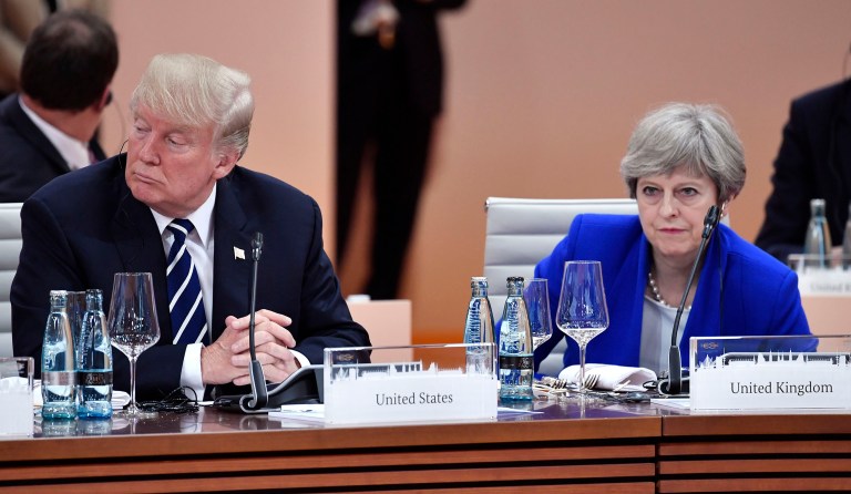British Prime Minister Theresa May praised President Trump's decision to keep up the United States' commitments to NATO after a campaign in which he seemed ready to pull back from the organization. (John MacDougall/Pool Photo via AP)