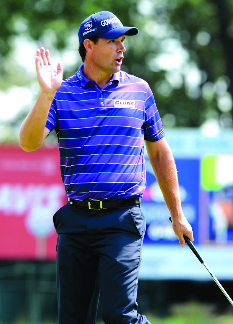 Henny Ray Abrams/AP
Padraig Harrington shot an opening-round 64 to hold the first-round lead at the Barclays.