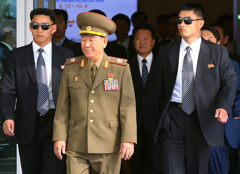 Hwang Pyong So, center left, vice chairman of North Koreaâs National Defense Commission, and Choe Ryong Hae, center right, a secretaries of the North Koreaâs ruling Workers Party, arrive at the Incheon International Airport in Incheon, South Korea, Saturday, Oct. 4, 2014. Choe  and other senior officials visited to the South Korea on Saturday for the close of the Asian Games sporting event, South Korean officials said, a rare visit by Pyongyang's inner circle that will include a meeting with Seoul's top official for North Korean affairs.(AP Photo/Yonhap, Kim Do-hoon) KOREA OUT