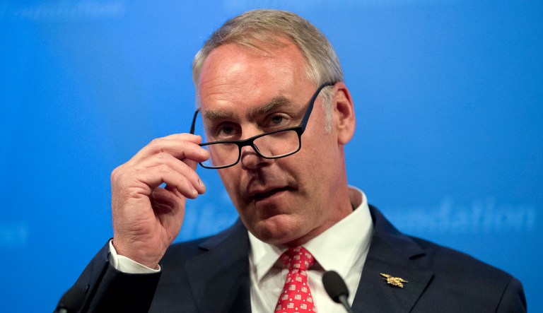 Christine Bauserman, Interior Secretary Ryan Zinke's special assistant, resigned after a CNN KFile review showed that she posted remarks on Facebook and Twitter that espoused conspiracy theories, anti-Muslim, and anti-LGBT views. (AP Photo/Andrew Harnik,File)