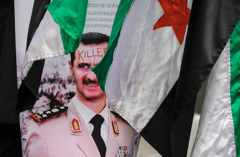 That statement goes much further than the Trump administration's demurrals about Assad's future. (AP Photo/Vadim Ghirda)