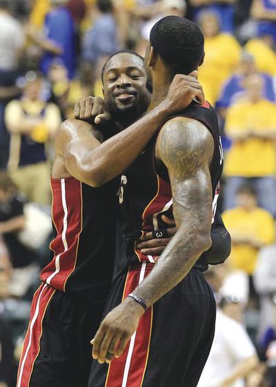 James, Wade turn on the Heat