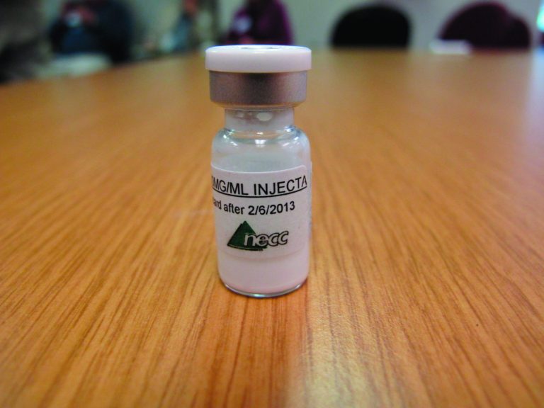 A vial of injectable steroids from the New England Compounding Center is displayed in the Tennessee Department of Health in Nashville, Tenn., on Monday, Oct. 8, 2012. The CDC has said an outbreak of fungal meningitis may have been caused by steroids from the Massachusetts specialty pharmacy. (AP Photo/Kristin M. Hall)