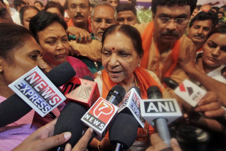 Anandiben Patel, center, an Indian politician and member of the Bharatiya Janata Party (BJP) speaks to the media after attending a legislative meeting in Gandhinagar, India. Patel Wednesday was elected as the Legislature Party Leader who will succeed Prime Minister elect Narendra Modi as chief minister of the Gujarat state. (AP Photo/Ajit Solanki)