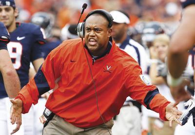 Steve Helber/AP
Mike London has Virginia two wins from qualifying for its first bowl game since 2007.