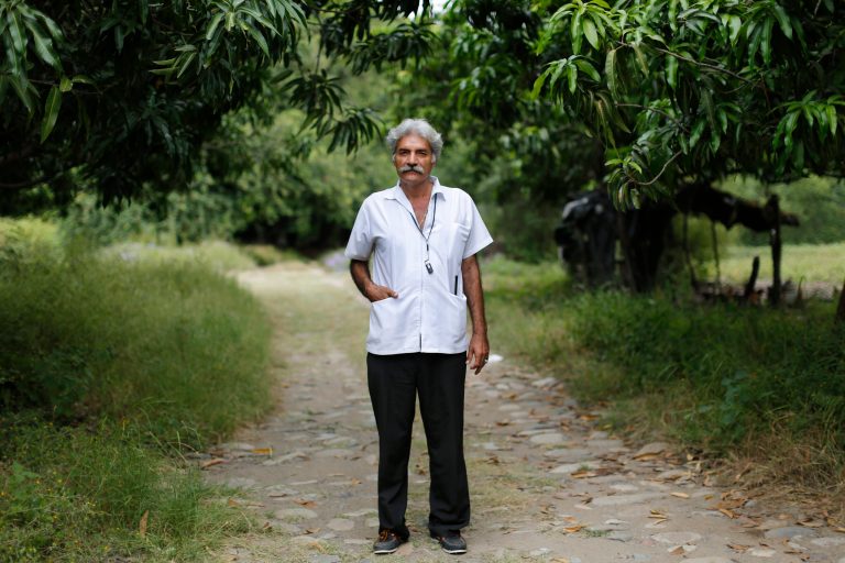 FILE - In this Nov. 6, 2013 file photo, Doctor Jose Manuel Mireles, leader of his town's self-defense group, poses for a portrait on his property in Tepalcatepec, in the state of Michoacan, Mexico. Vigilantes who have spent the last year beating back a drug cartel in Mexico said Thursday, May 8, 2014 they have dismissed Mireles as their chief spokesman, after he used unusually frank language to challenge President Enrique Pena Nieto. He had become the public face of the 