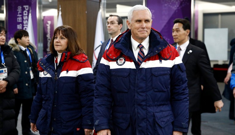 Vice President Mike Pence, right, left within minutes of arriving at a reception hosted by South Korean President Moon Jae-in. Pence had been set to sit at the same table as Kim Yong-nam, North Korea's ceremonial head of state. (AP Photo/Patrick Semansky, Pool)