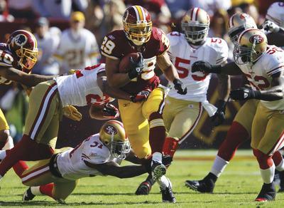 Patrick Semansky/AP
Roy Helu, along with fellow rookies Leonard Hankerson and Maurice Hurt, is in the starting lineup because of an injury.