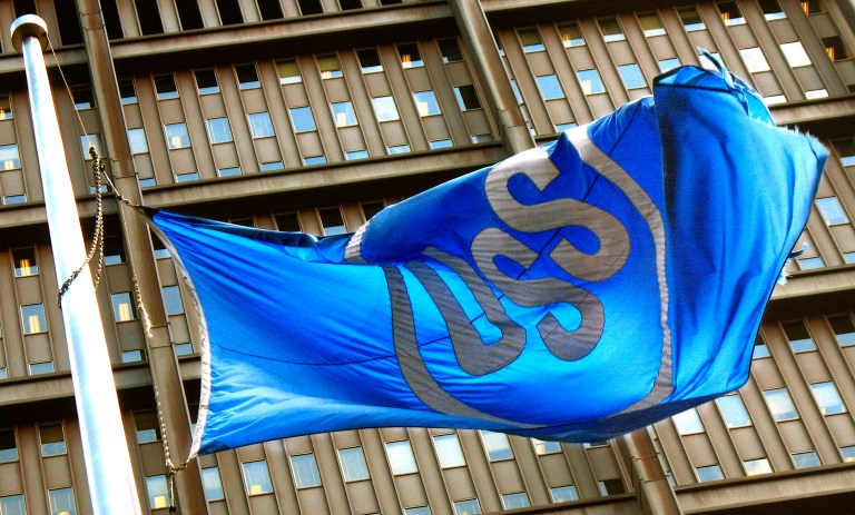 FILE - In this April 29, 2008 file photo, the U.S. Steel Corp. flag flies in front of their headquarters building in Pittsburgh. US Steel reports quarterly financial results after the market closes on Monday, Jan. 27, 2014. (AP Photo/Keith Srakocic, File)