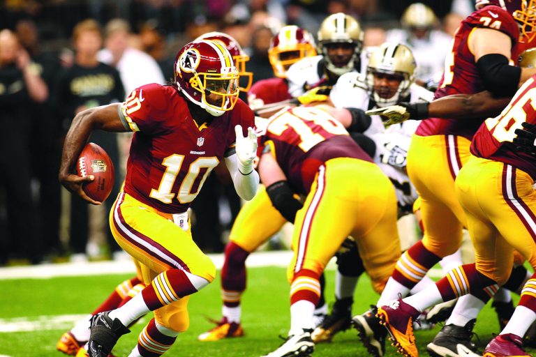 Bill Haber/AP
Washington Redskins quarterback Robert Griffin III had 10 rushes for 42 yards in Sunday's win over the New Orleans Saints.