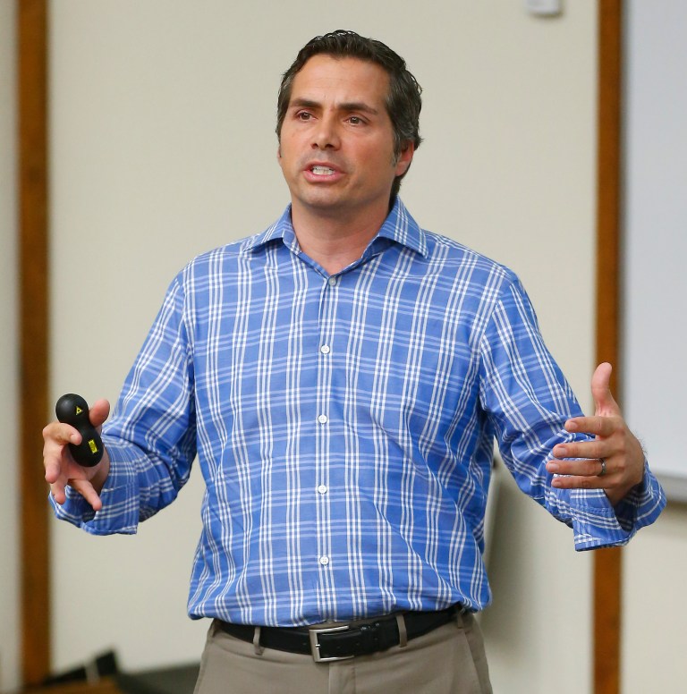 Independent U.S. Senate candidate Greg Orman discusses voting trends with a class at Washburn University in Topeka, Kan., Wednesday, Sept. 17, 2014. (AP Photo/The Capital Journal, Chris Neal)