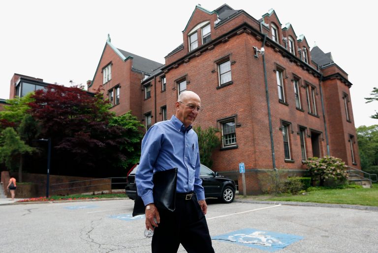 Peter Bristol of Wakefield, R.I. leaves Butler Hospital in Providence, R.I., after receiving an intravenous infusion, Monday, June 9, 2014. Bristol is part of a major study that got under way Monday to see if an experimental drug could protect outwardly healthy seniors whose brains harbor silent signs that they're at risk for Alzheimer's disease. In one of the most ambitious attempts yet to thwart Alzheimer's disease, a major study got under way Monday to see if an experimental drug can protect healthy seniors whose brains harbor silent signs that they're at risk. (AP Photo/Michael Dwyer)