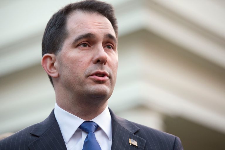 Wisconsin Gov. Scott Walker defended New Jersey Gov. Chris Christie's handling of the bridge closure scandal. (AP/Jacquelyn Martin)