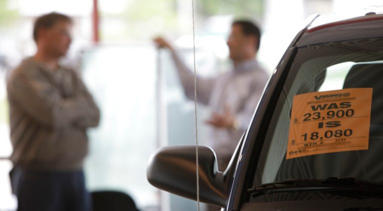 Justices declined to hear whether a car dealer committed unfair labor practices. (AP Photo/M. Spencer Green)