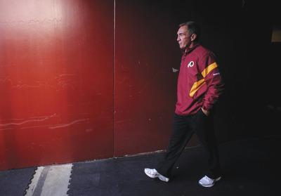 Cliff Owen/AP
Coach Mike Shanahan and the Washington Redskins reached the season's midpoint on a four-game losing streak.