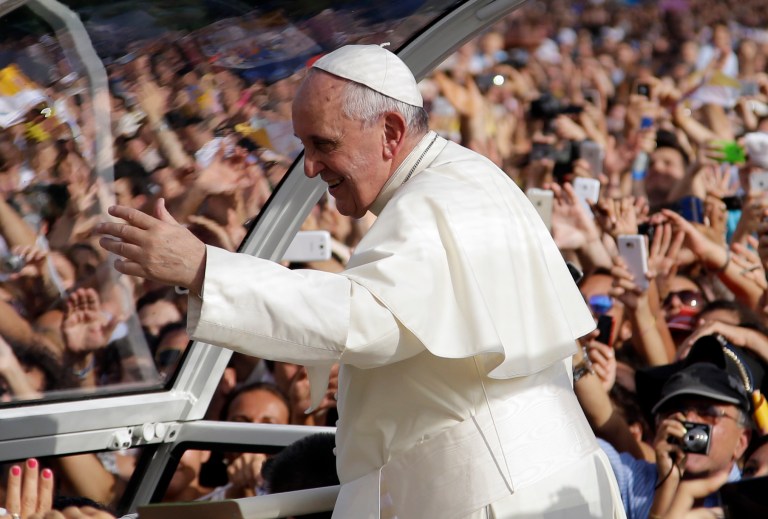 Pope Francis arrives to celebrate a mass in Caserta, Italy, Saturday, July 26, 2014. Pope Francis will remain in Caserta for a few hours, but will be back here for a private visit on Monday. (AP Photo/Gregorio Borgia)