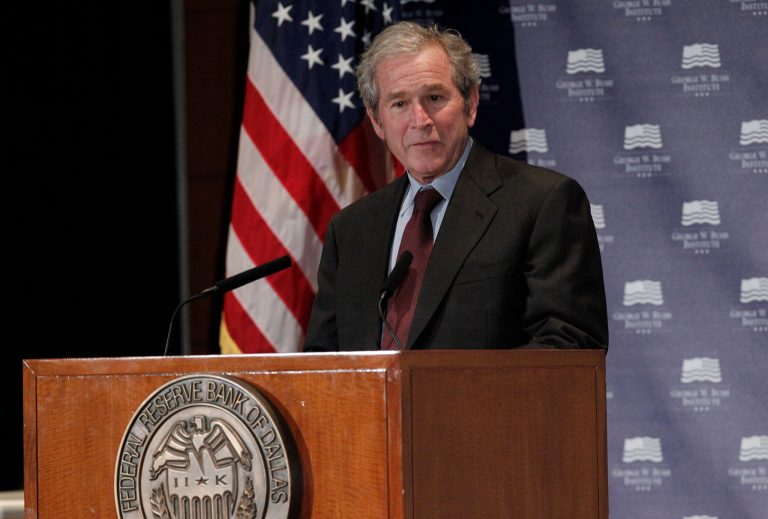   Former President George W. Bush gives opening remarks at the Federal Reserve Bank of Dallas for a conference titled 
