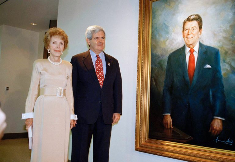 House Speaker Newt Gingrich and former first lady Nancy Reagan pause at a portrait of former President Ronald Reagan during a Gingrich visit to the Ronald Reagan Library and Museum in Simi Valley, California, on Friday, July 21, 1995. Gingrich toured the museum and spoke to a gathering of library patrons. Former President Reagan did not attend. (AP Photo/Reed Saxon)