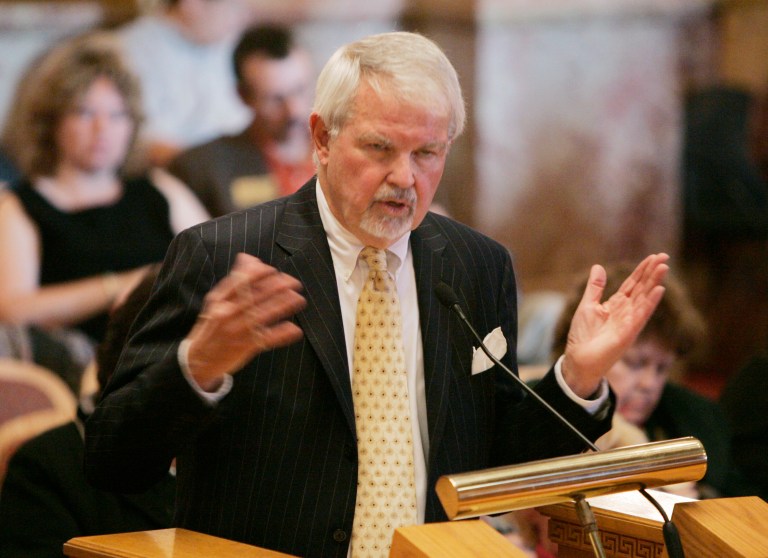 The plaintiffs include former Colorado Gov. Richard Lamm, a Democrat, who called it 