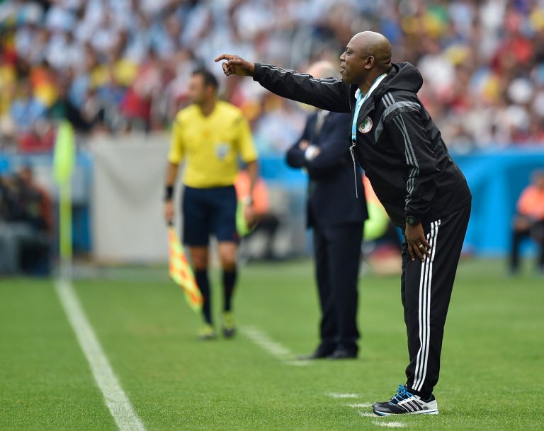 Nigeria's coach Stephen Keshi gives instructions to his players during the group F World Cup soccer match against Argentina at the Estadio Beira-Rio in Porto Alegre, Brazil, Wednesday, June 25, 2014. (AP Photo/Martin Meissner)