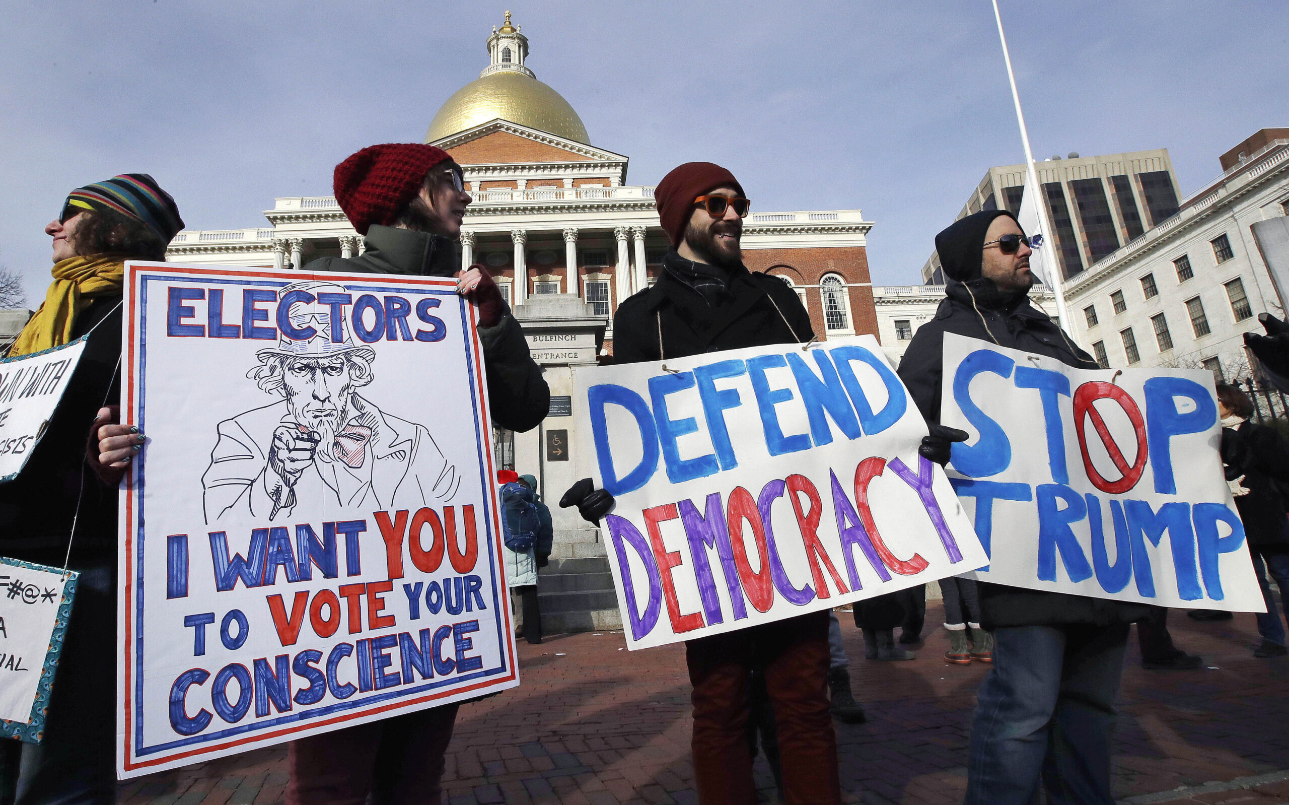 Watch: Protesters harangue electors for voting for Trump